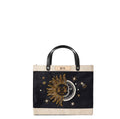 Petite Market Bag in Black with Sun & Moon Bead, front view: gold and pearl beaded sun and crescent moon embroidery with beaded stars on black jute, natural leather label personalized with initials, black leather handles