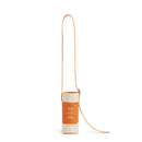 Crossbody Bottle Bag in Cognac