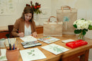 description_The artist Amy Logdson at work at her home studio